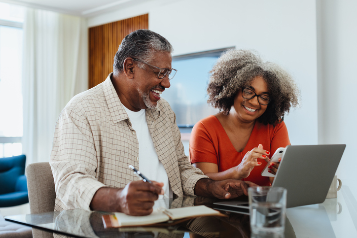 A couple making adjustments to their retirement plan.