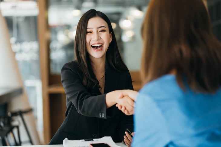 Happy, successful woman at a job interview